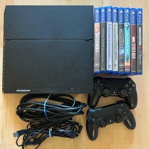 Sony Black PlayStation 4 Console + 2 Controllers + 8 Games + All Cables